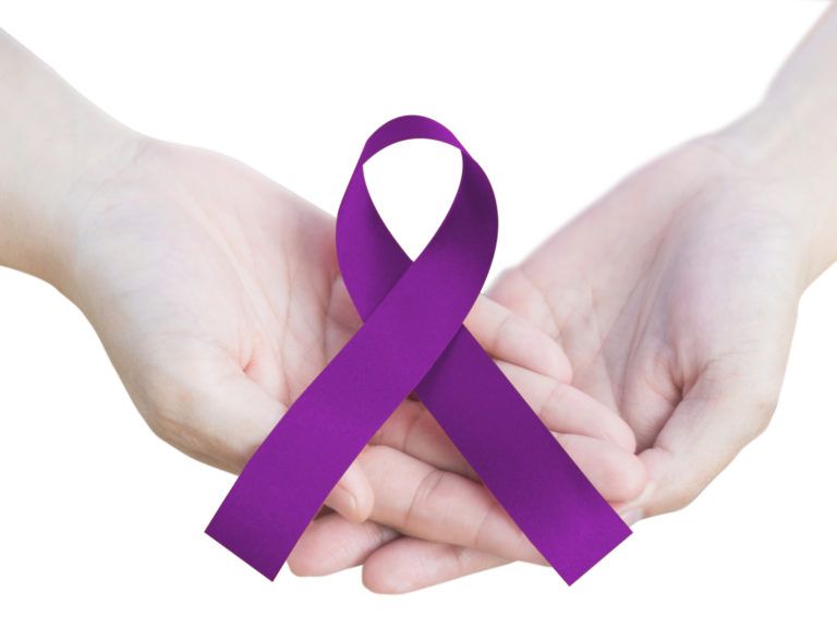 Purple ribbon to raise awareness for animal abuse, Alzheimer's disease, domestic violence, epilepsy, lupus, sarcoidosis, Crohn's disease and pancreatic cancer isolated on white background with clipping path