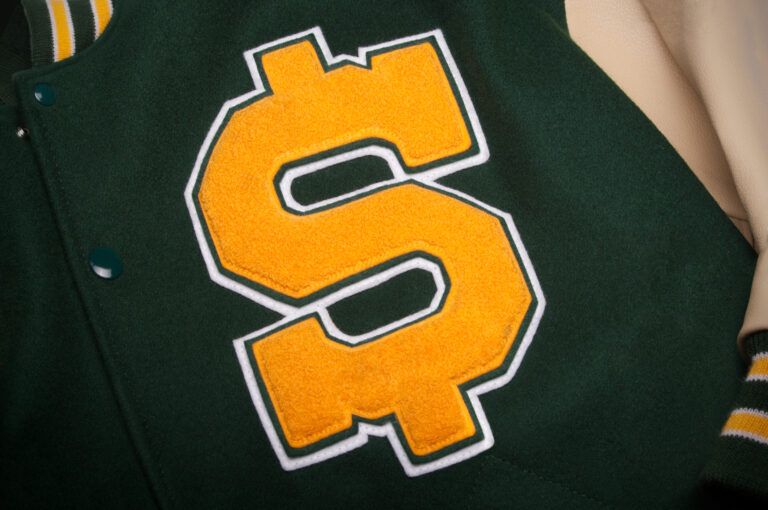 Letterman jacket with a dollar symbol