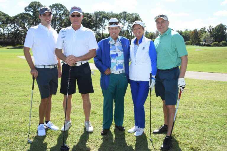 Raymond James (Jon Alexander Ron Hartz Carol Whaley Vin Campagnoli) with Chi Chi Rodriguez in 2019
