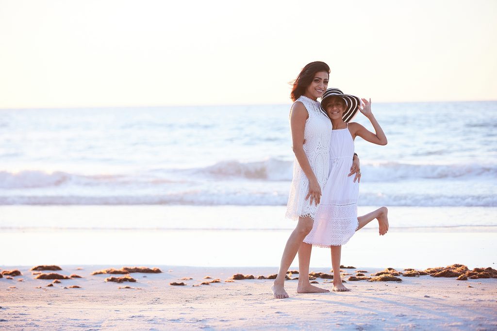 Shilen Patel's wife and daughter on the beach hugging