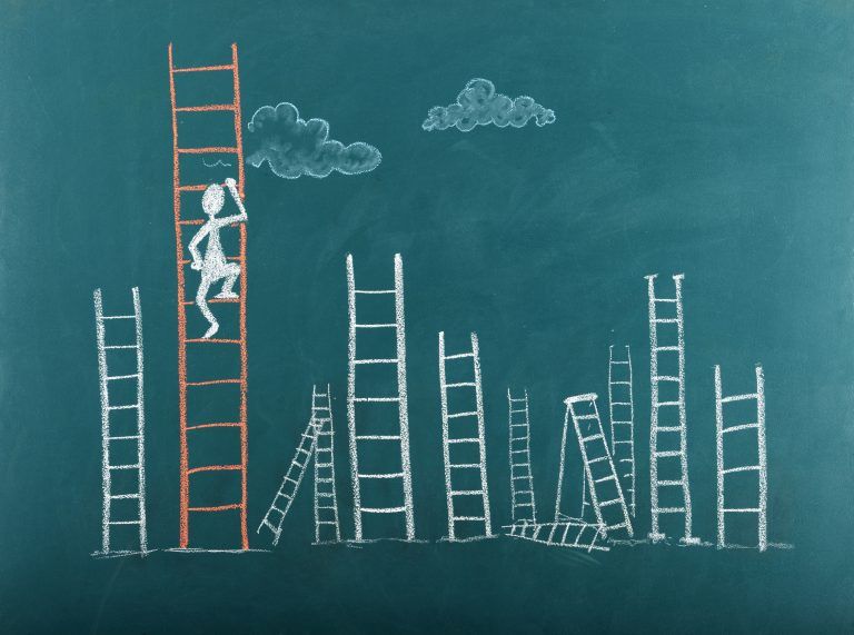 Stick figure climbing ladder to success