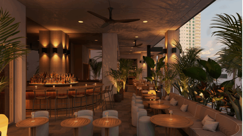 Outdoor lounge seating at Forbici Sundial with greenery.