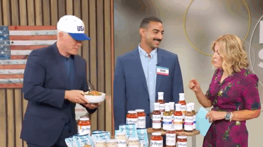 David Habib, CEO of Yo Mama’s Foods, appears on “Good Morning America” with hosts as the brand’s sauces and condiments are featured on air.
