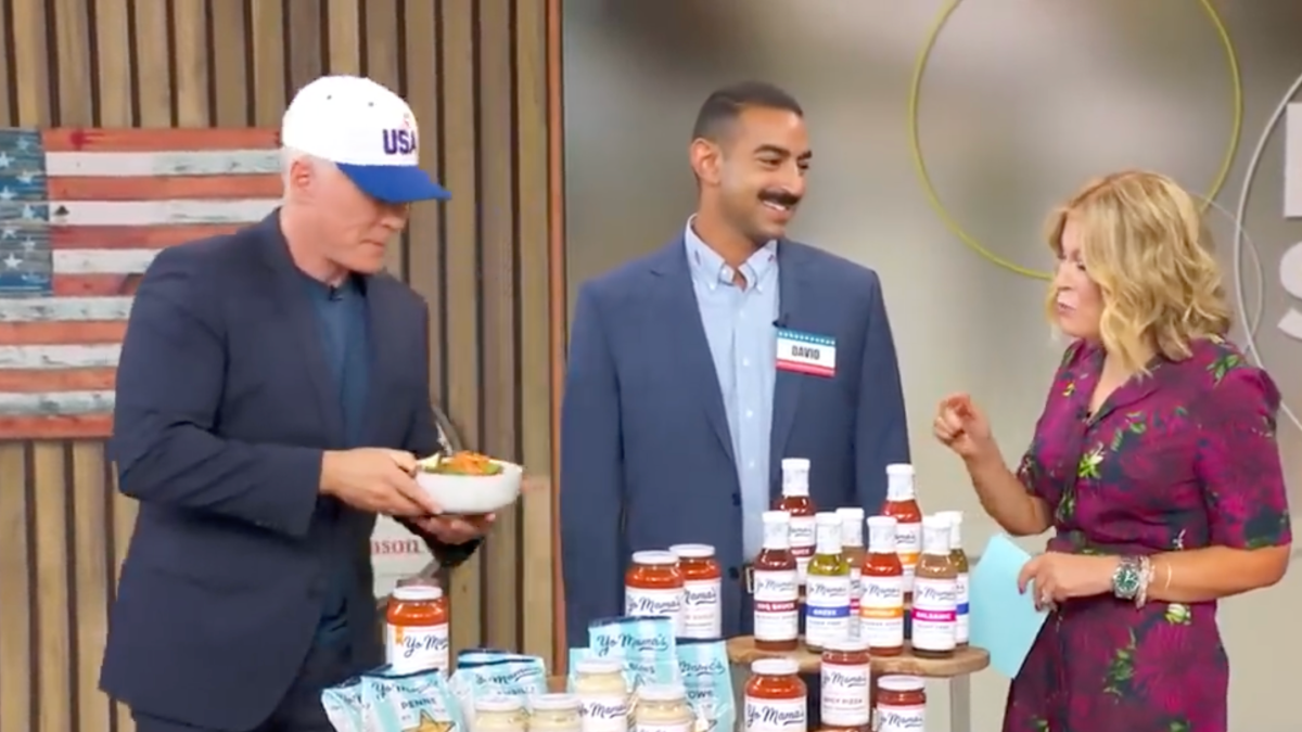 David Habib, CEO of Yo Mama’s Foods, appears on “Good Morning America” with hosts as the brand’s sauces and condiments are featured on air.