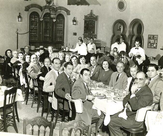 Historic black-and-white photo showing Columbia Restaurant staff and family members.