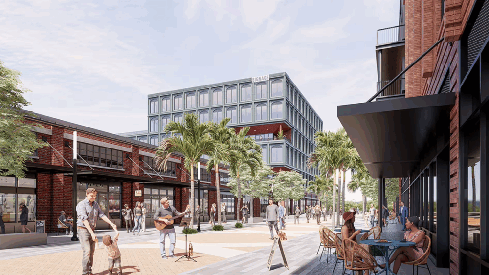 Street-level rendering of Ybor City’s Gasworx district with pedestrians, palm trees, and outdoor dining areas leading toward the new office tower.