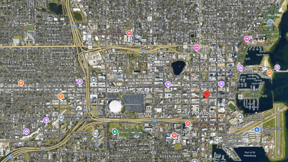 A satellite map view of downtown St. Petersburg, Florida, highlighting the location of EVO Apartments near Central Avenue, the St. Pete Pier, and surrounding landmarks including The James Museum and Tropicana Field.