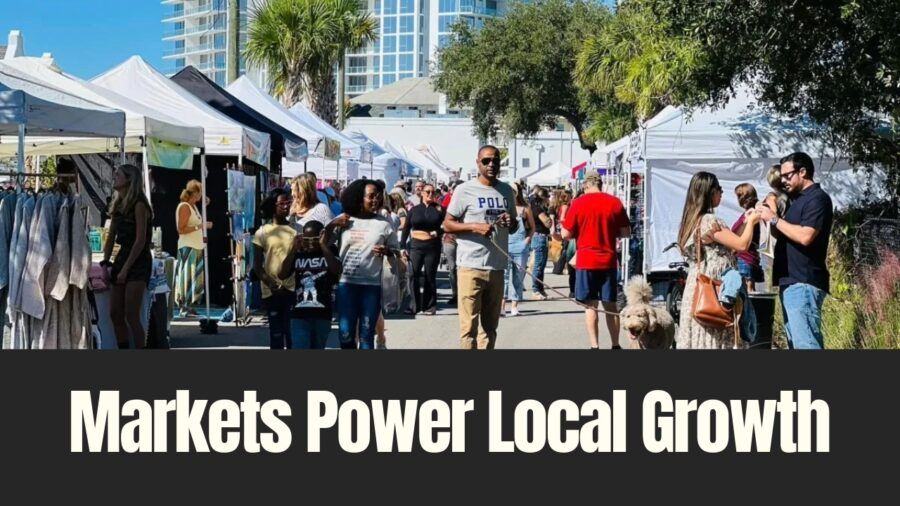 Shoppers walk between vendor tents at a Tampa Bay Markets event in downtown Tampa