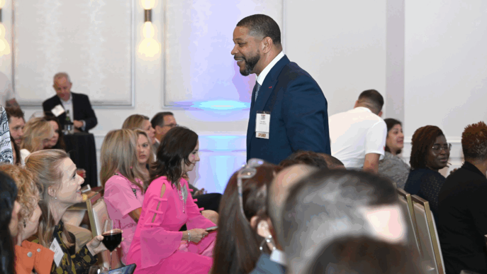 Gary Hartfield photographed among attendees at TBBW event.