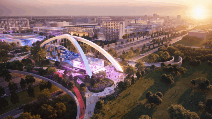 A bird’s-eye rendering highlights the full scale of the Gas Plant District proposal, spanning nearly 100 acres with housing, office, retail and open green space.