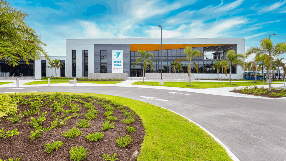 Exterior view of the Speer YMCA in St. Petersburg, a modern 19-acre facility built in partnership with Mangrove Bay Middle School.