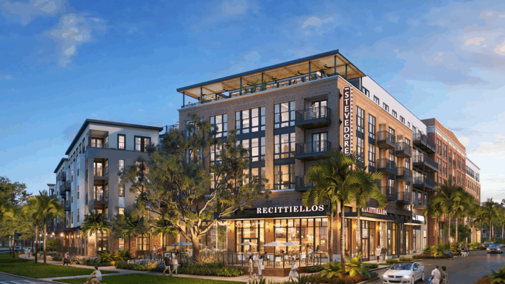 Rendering of The Stevedore building at Gasworx, featuring palm-lined sidewalks and street-level restaurant Recittiello’s.