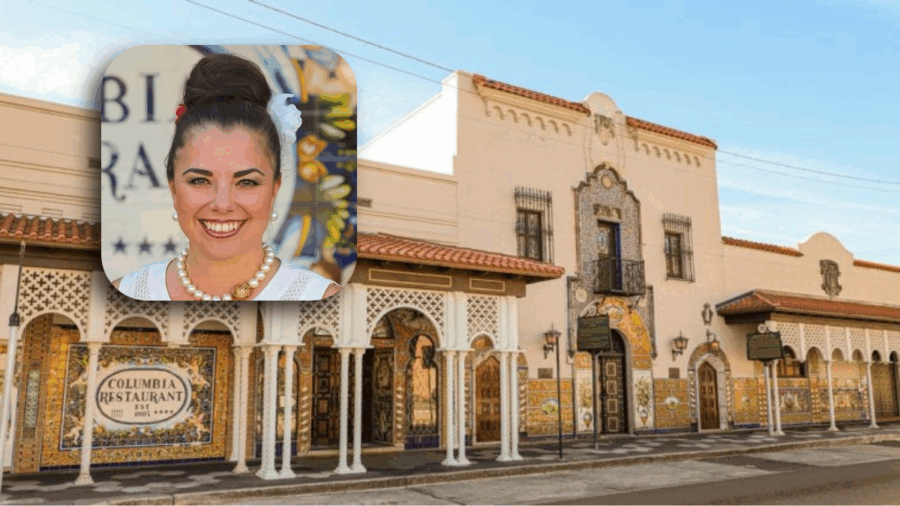 Andrea Gonzmart Williams, fifth-generation owner of Columbia Restaurant, pictured against the backdrop of the historic Ybor City restaurant exterior.
