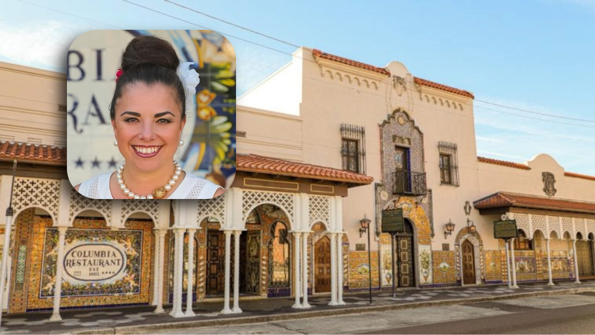 Andrea Gonzmart Williams, fifth-generation owner of Columbia Restaurant, pictured against the backdrop of the historic Ybor City restaurant exterior.