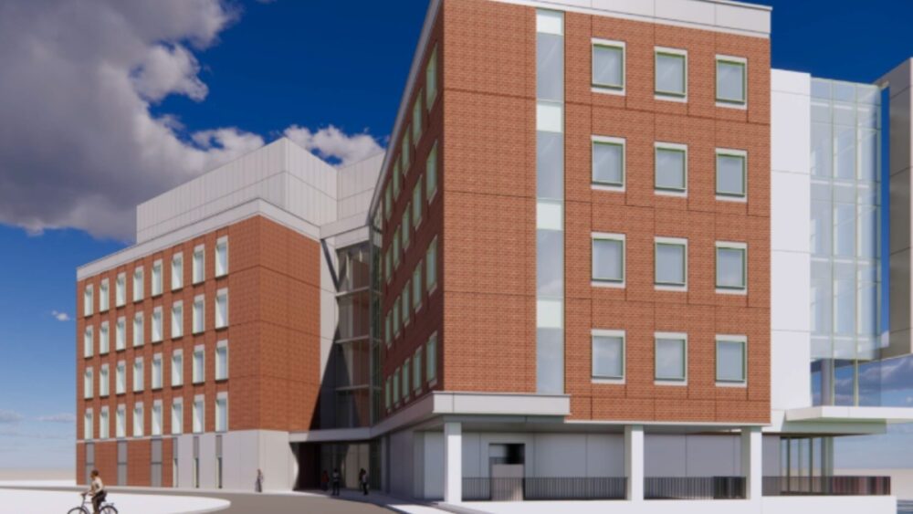 Front view of UTampa’s science and research building Front view of UTampa’s new science and research building with brick and glass.