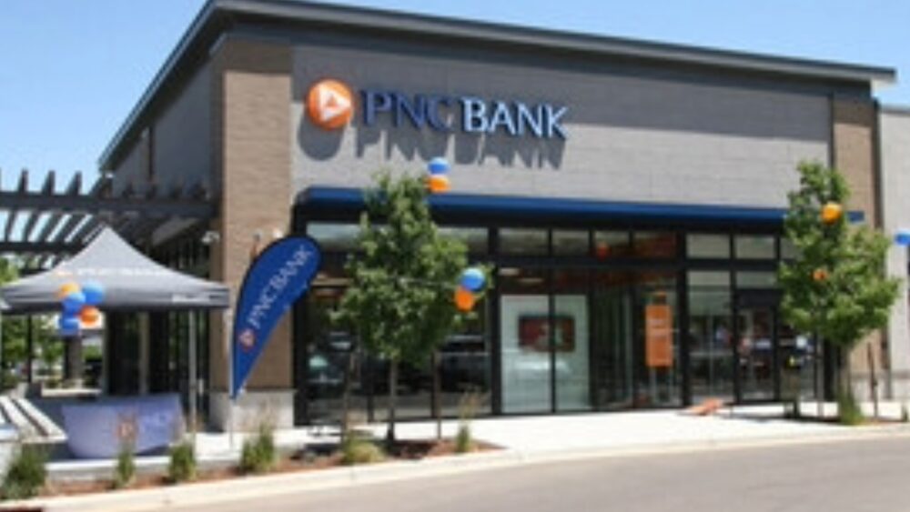 A modern PNC Bank branch exterior featuring contemporary design and customer entryway.