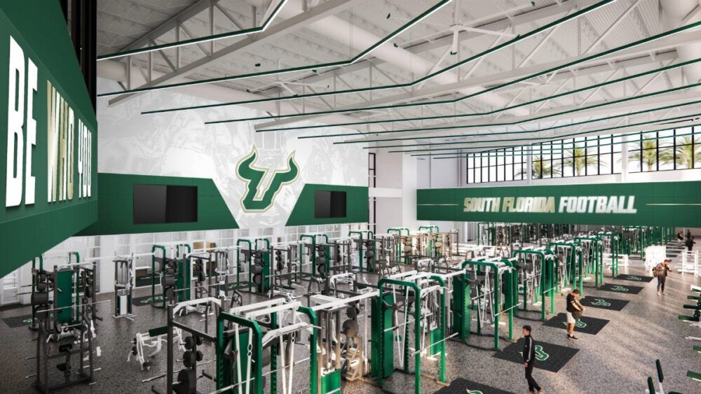 Interior rendering of the USF Football weight room featuring custom green-and-gold equipment and strength training stations.