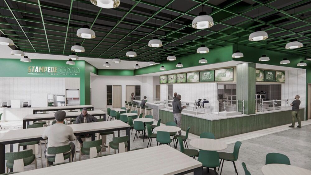 Interior rendering of the USF TGH Center for Athletic Excellence lobby featuring the Bulls logo and gold bull statue.