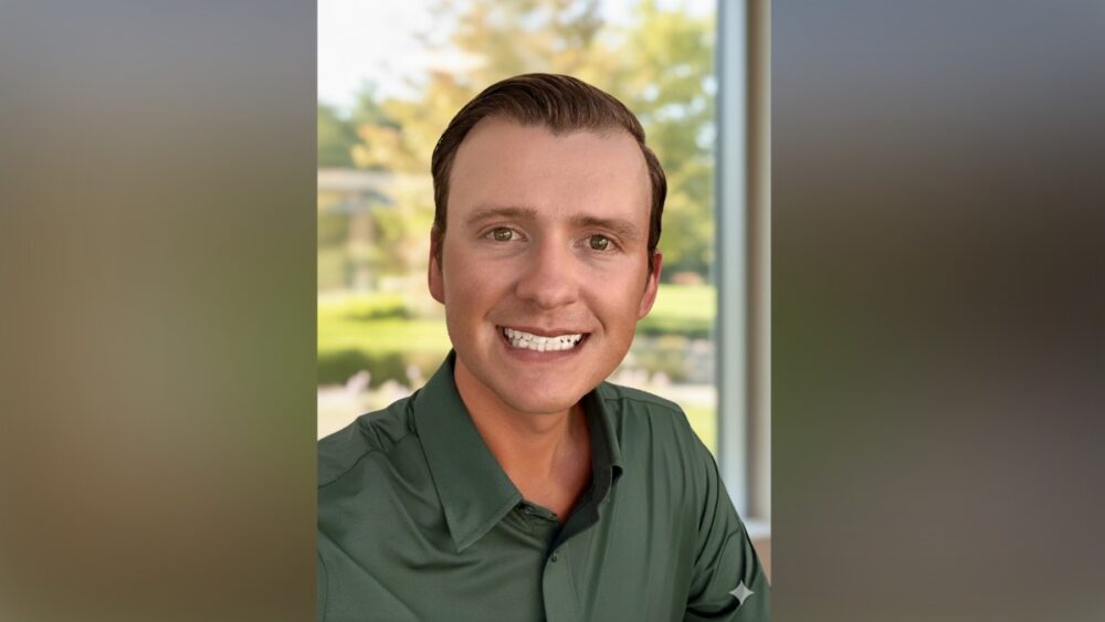 Tampa entrepreneur Will Freeman, founder of Catalyst Sports Ventures, photographed along the Tampa Riverwalk as the sun sets over downtown.