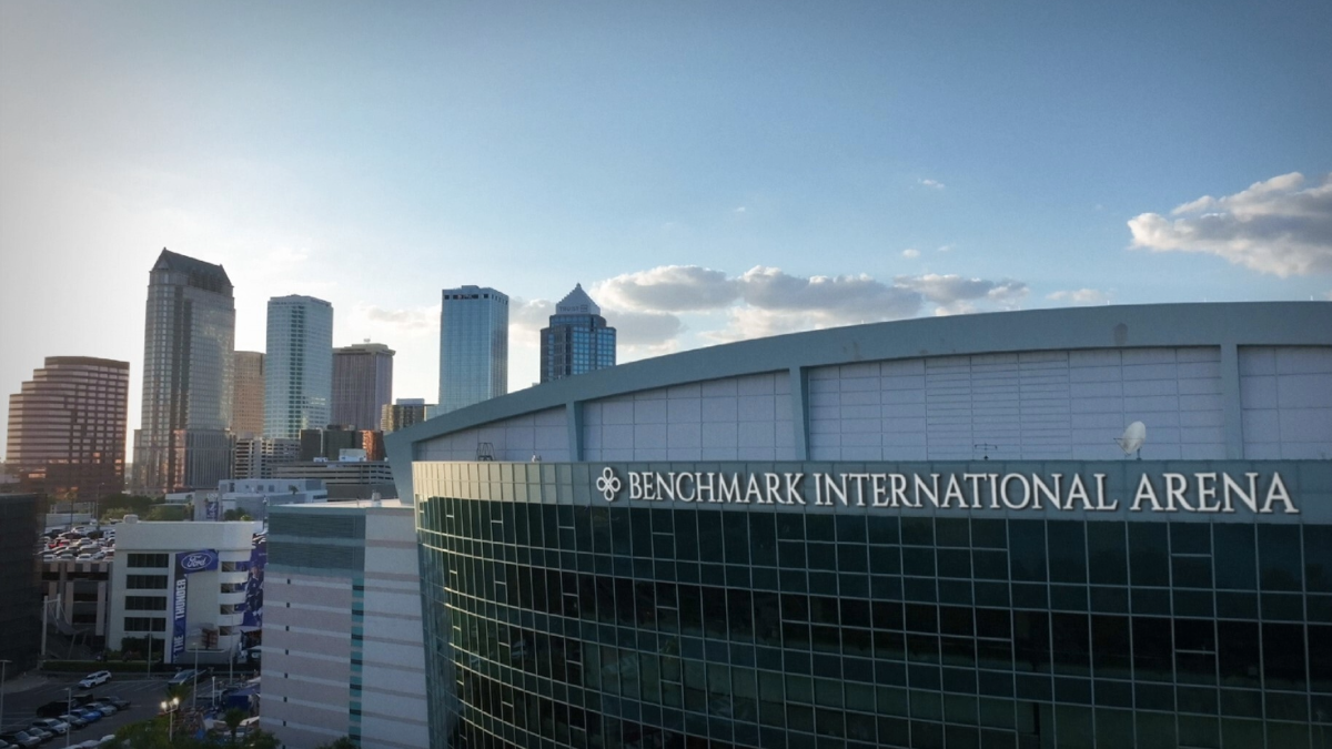 Exterior of Benchmark International Arena with the downtown Tampa skyline in the background