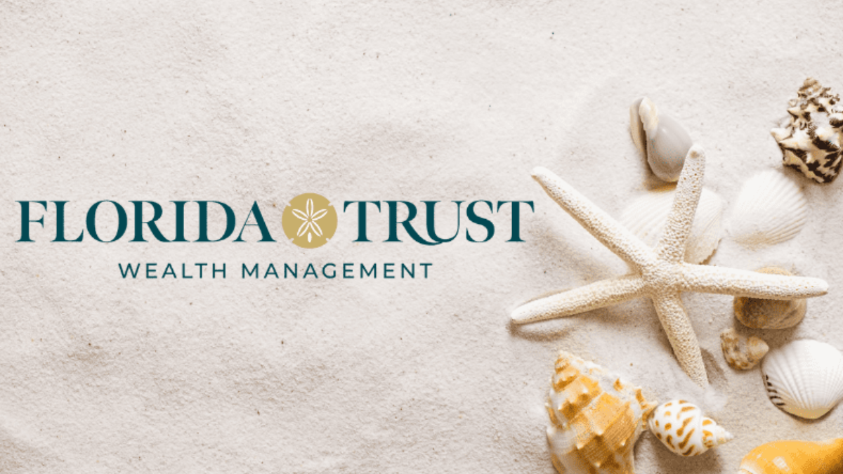 Florida Trust Wealth Management logo displayed on a sandy background with seashells and a starfish, symbolizing financial stability and coastal prosperity in Tampa Bay.