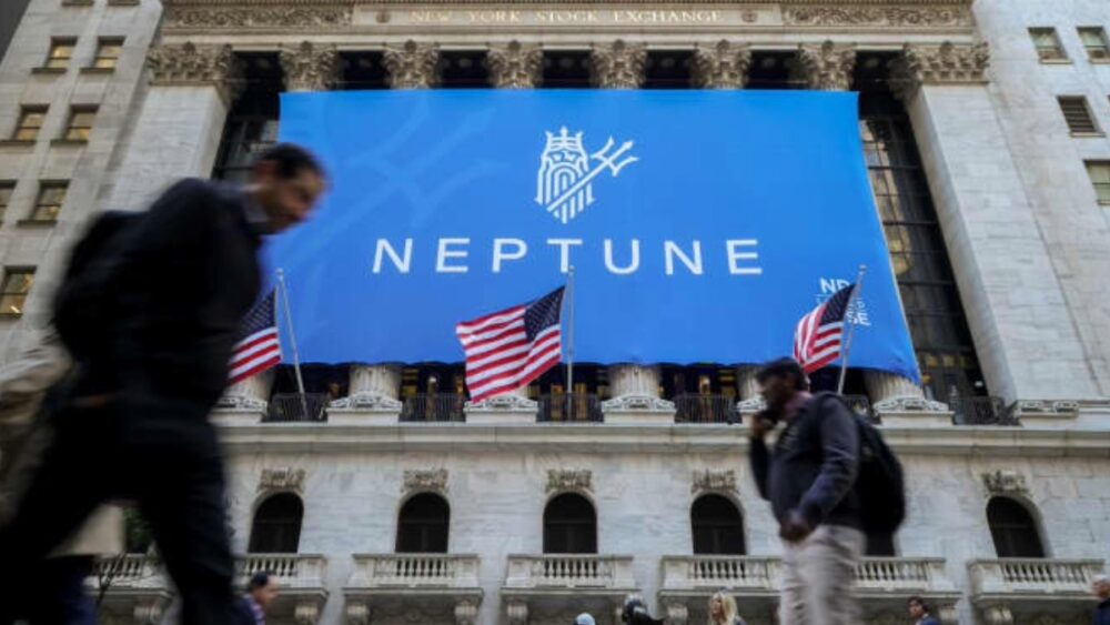 A large Neptune banner displayed on the New York Stock Exchange building on the day of the company’s NYSE debut.