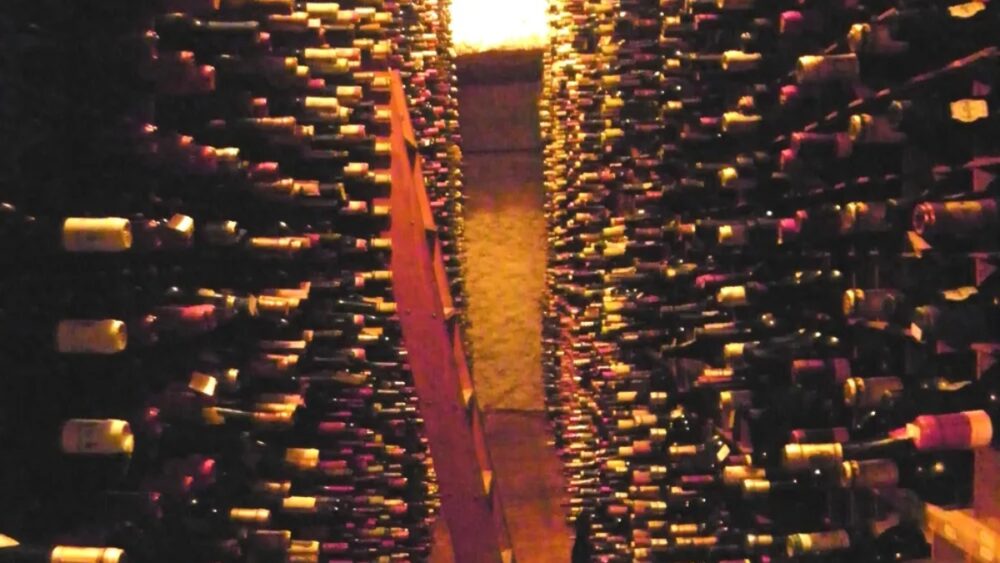 Rows of wine bottles stacked floor to ceiling inside the Bern’s Steak House wine cellar.