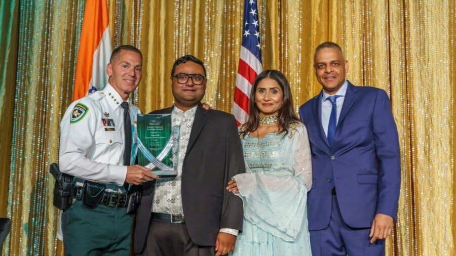 Sheriff Chad Chronister stands with members of the Indian Advisory Council during the 2025 Annual Banquet.