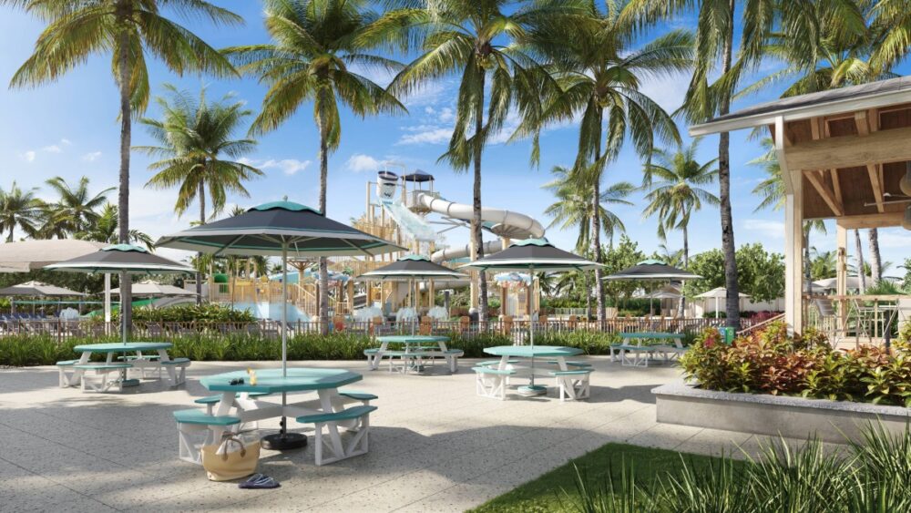 South Seas Resort Pool View Pool area at South Seas framed by palm trees with lounge chairs and tropical landscaping.