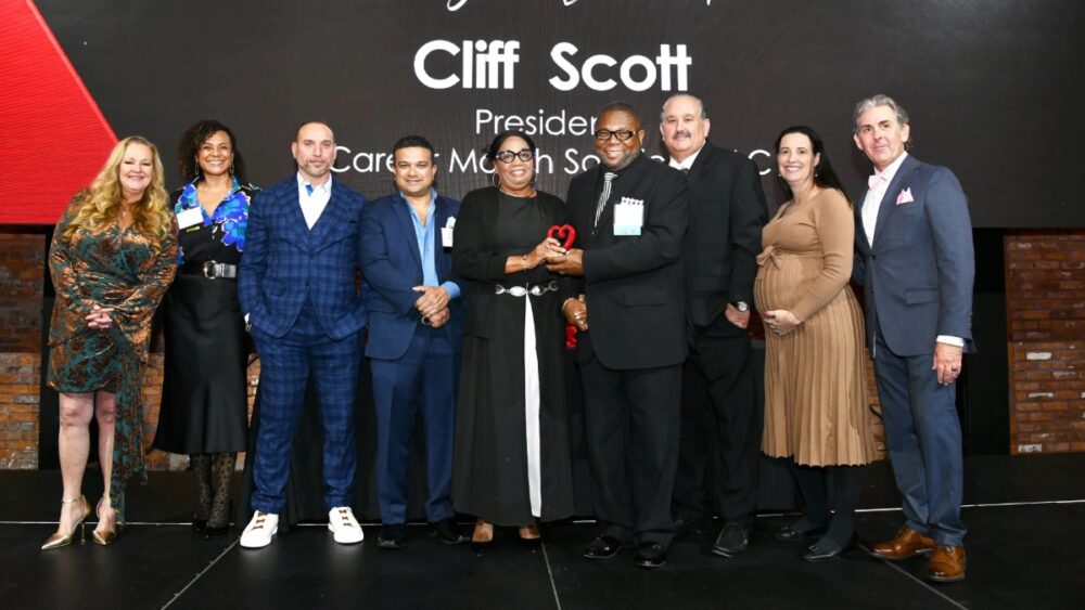 Group photo on stage during the presentation of the Individual Category honor for Career Match Solutions LLC at the 2025 TBBW Philanthropists of the Year Awards.