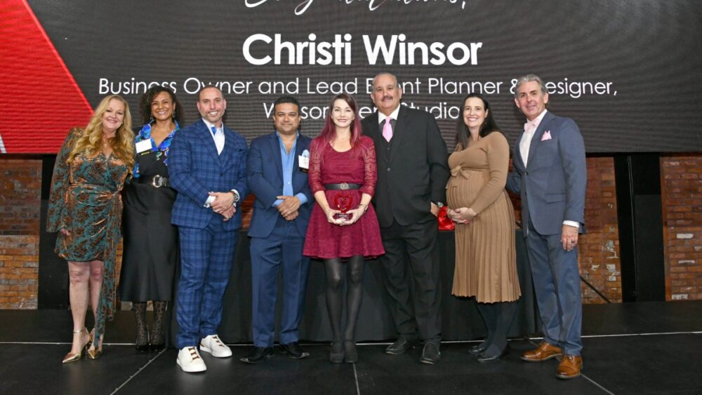 Group photo on stage during the presentation of the Volunteer Category honor for Winsor Event Studio at the 2025 TBBW Philanthropists of the Year Awards.