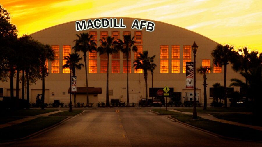 MacDill Air Force Base building at sunset with palm trees in front