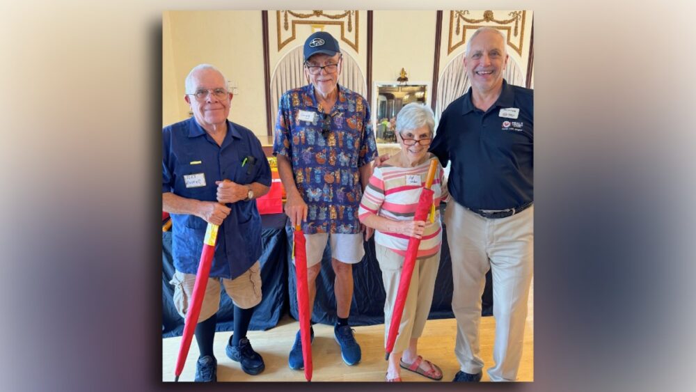 Steve King spends time with older adults he serves through Meals on Wheels Tampa during a community event.