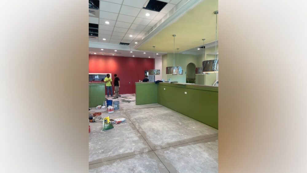 Interior construction underway at the new Chicken Salad Chick restaurant in Parrish, with workers preparing the space ahead of opening day.