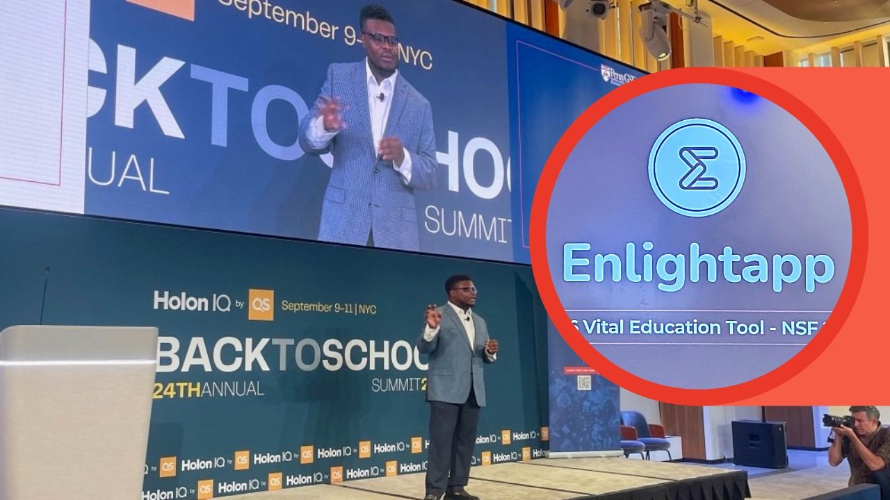 Dieumerci Christel sitting in a conference room wearing an NDSU sweatshirt while working on Enlightapp.