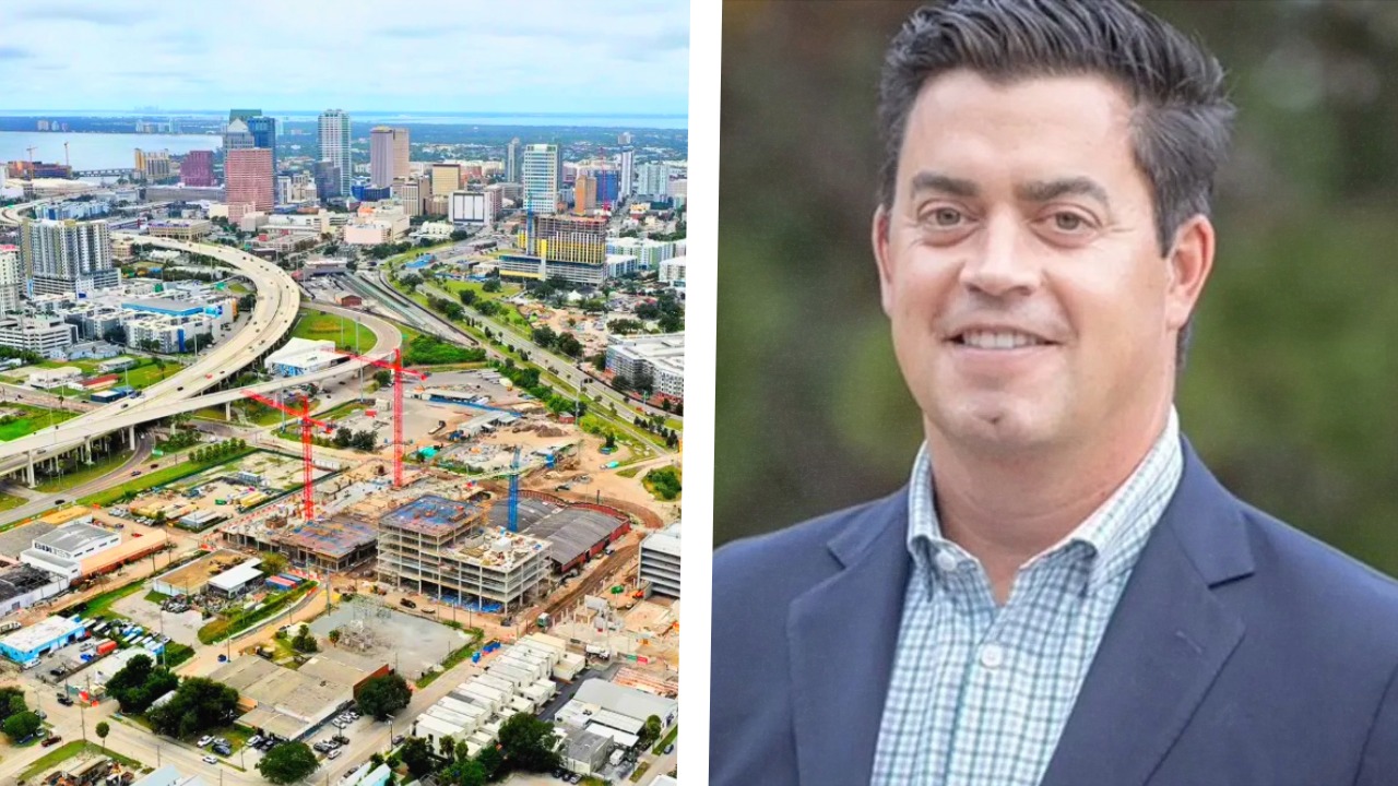 Aerial view of the Gasworx construction site with cranes, new buildings and downtown Tampa in the distance.