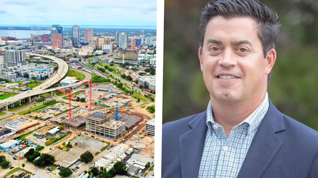 Aerial view of the Gasworx construction site with cranes, new buildings and downtown Tampa in the distance.