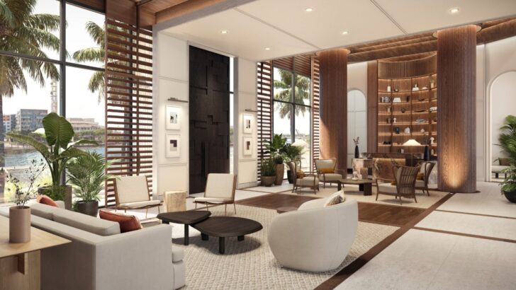 The lobby lounge at Pendry Tampa with modern seating and warm wood design
