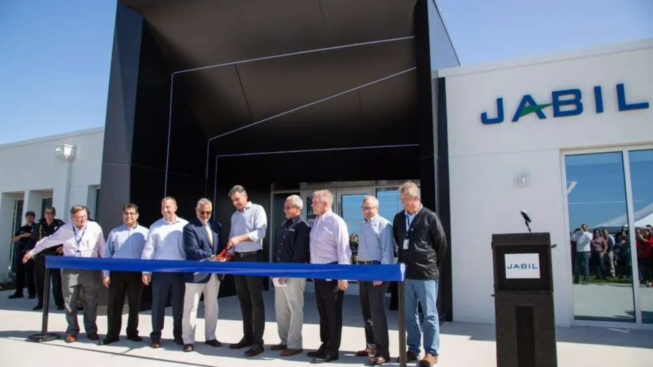 Jabil executives and local leaders take part in a ribbon-cutting at a Jabil facility in Tampa Bay