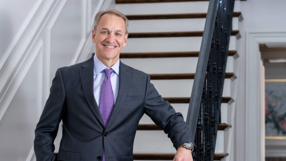 Nelson Castellano portrait Nelson Castellano standing on a staircase inside a Tampa home.