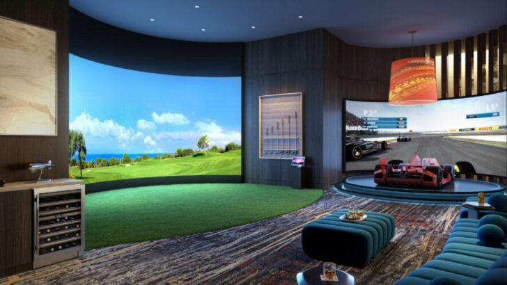 Interior rendering of ONE Tampa’s resident amenity space featuring a golf simulator, racing simulator and lounge seating.