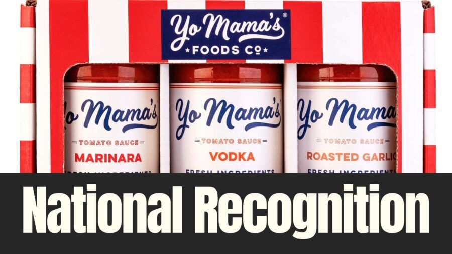 Yo Mama’s Foods pasta sauce jars displayed in branded packaging highlighting national recognition
