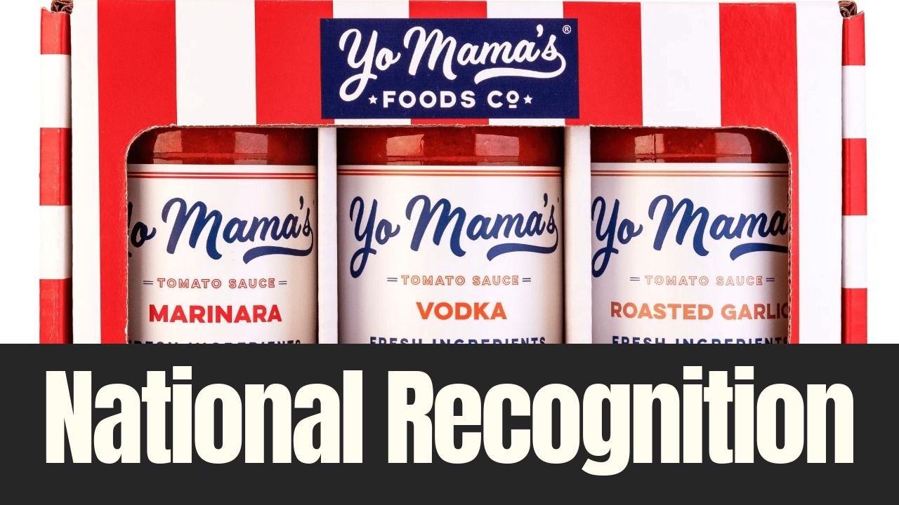 Yo Mama’s Foods pasta sauce jars displayed in branded packaging highlighting national recognition