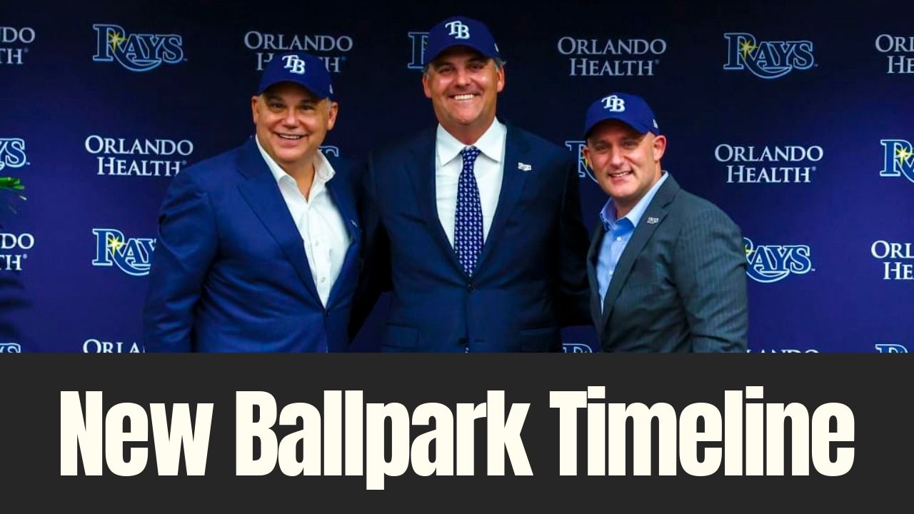 Tampa Bay Rays executives pose together at a team event announcing a new ballpark timeline.
