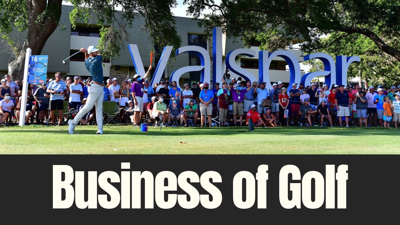 Golfer tees off at the Valspar Championship with spectators lined behind the fairway signage in Tampa Bay.