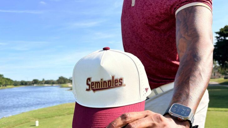 Campus Course Florida State Seminoles hat shown on a golf course, paired with a garnet polo.