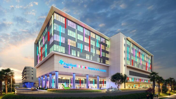Rendering of Pagidipati Children’s Hospital at St. Joseph’s in Tampa with a colorful exterior lighting design at night