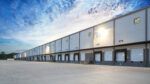 Modern industrial warehouse with multiple loading docks and trailer bays in Tampa