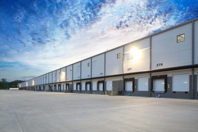 Modern industrial warehouse with multiple loading docks and trailer bays in Tampa