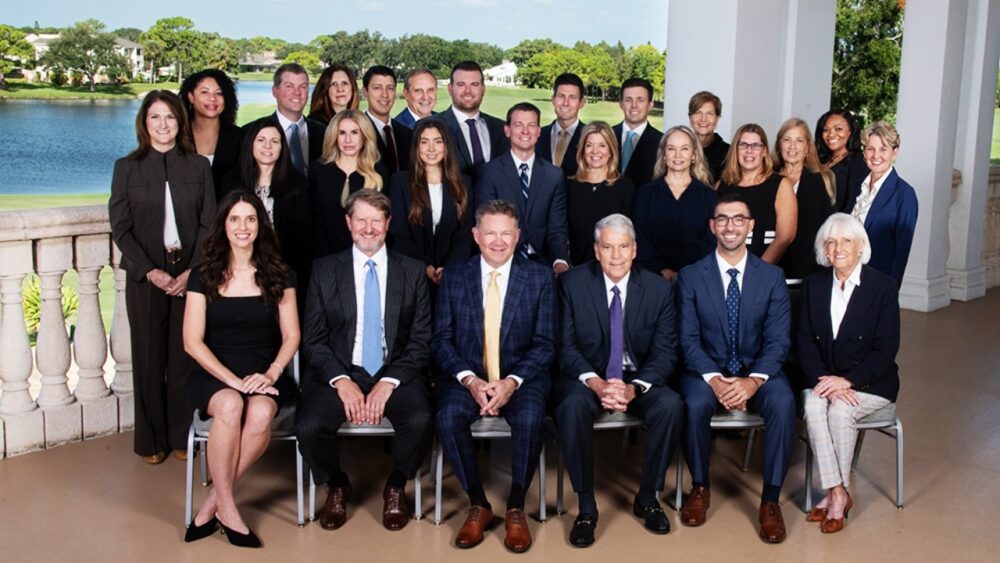 Florida Trust Wealth Management team members pose for a group photo at the firm’s Tampa Bay office.